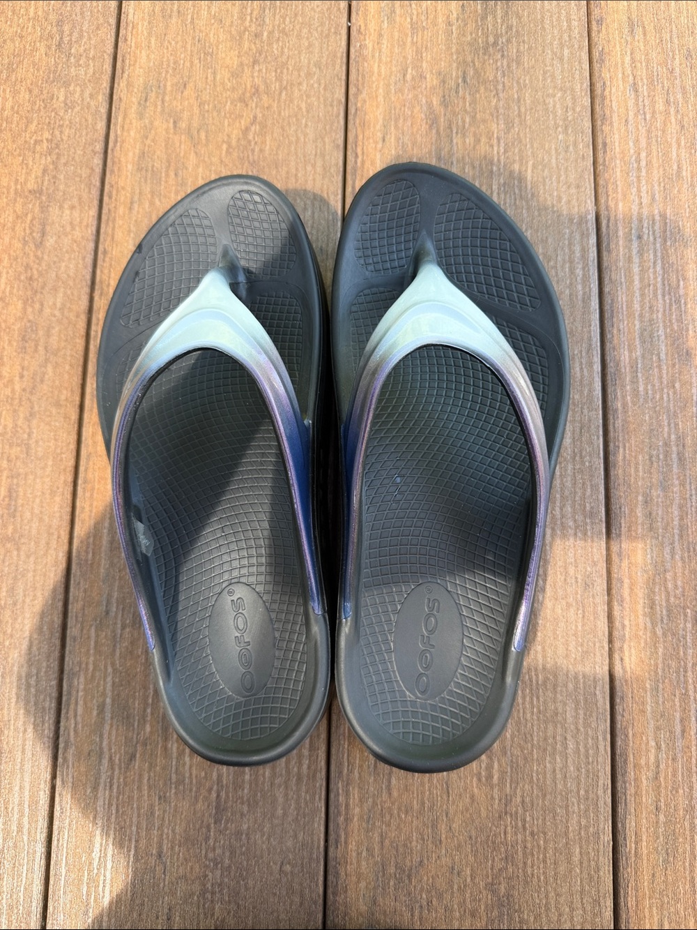 OOFOS Black Flip Flops with Iridescent Straps